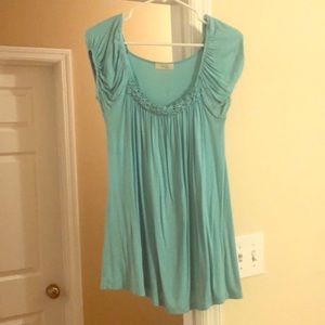 Turquoise shirt, size medium/large. Very soft!